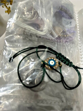 Green Evil Eye Cord Bracelet Like New